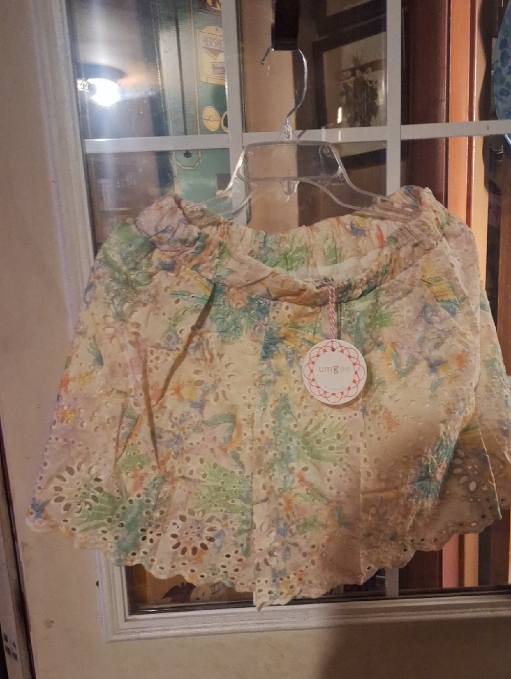 Umgee Pastel Floral Eyelet Shorts With Pockets And Fully Lined.